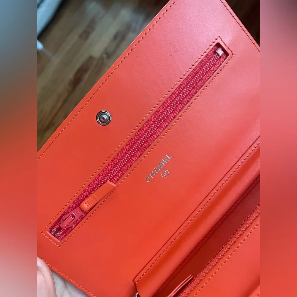 CHANEL Orange Quilted Patent Leather Crossbody Bag